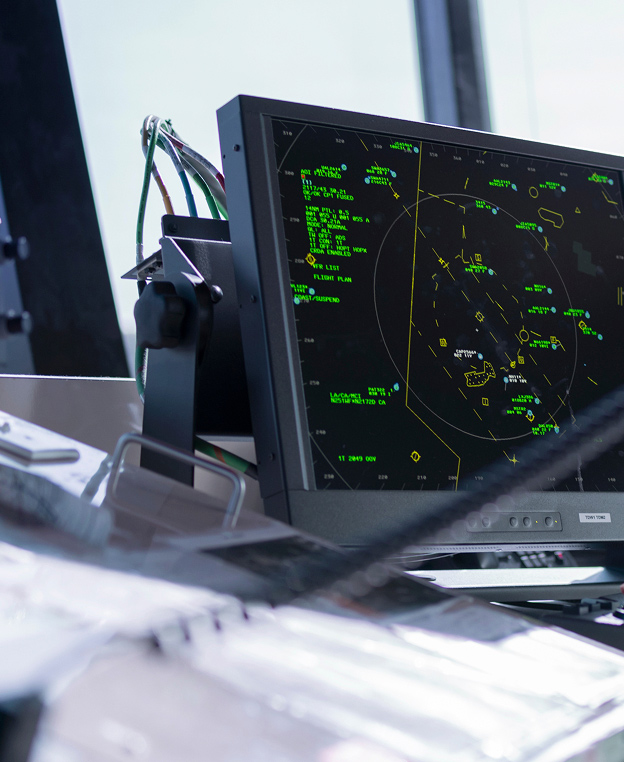 A computer monitor displaying an air traffic radar program